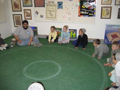 J Teaching Games to Kids at the Moon